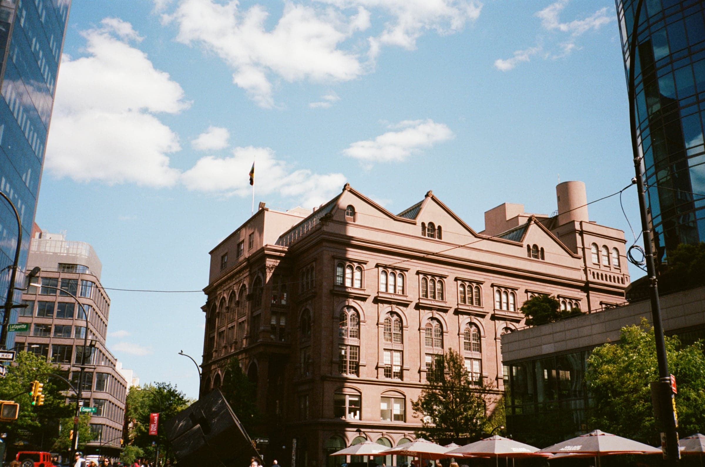 Brownstone building under a blue sky