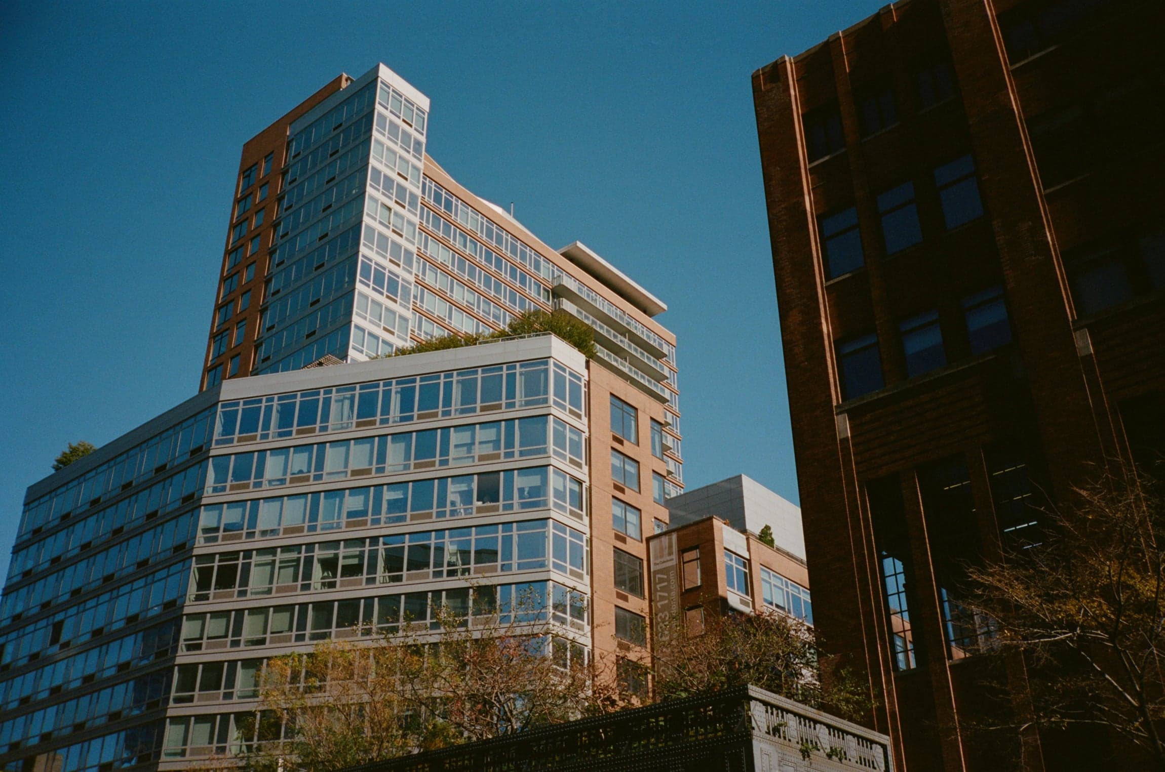 Apartment buildings against a blue sky
